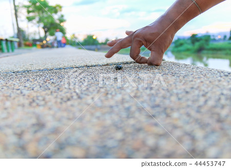 Ok hand sign. on stone in the public park 44453747