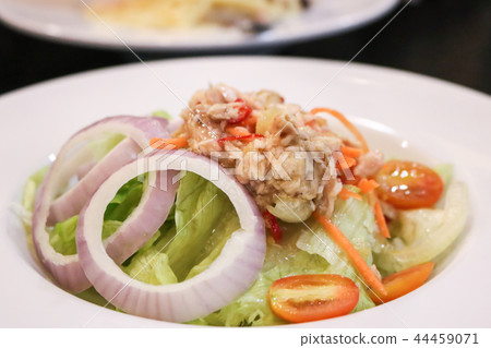 Close up of Tuna spicy salad in the restaurant. Close up of Tuna spicy salad in the restaurant. 44459071