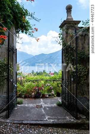 Opened gates with view to Lake Como 44467723