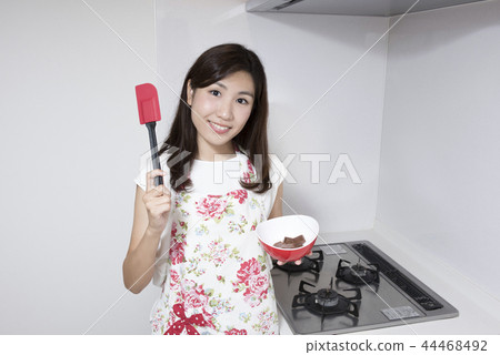 Woman making handmade chocolate Woman making handmade chocolate 44468492