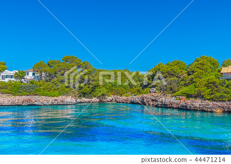 Menorca Island Coast Cliffs with Clean Blue Water 44471214