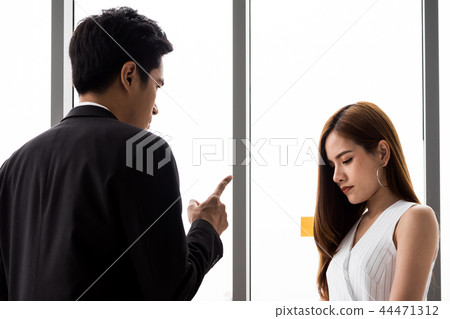 Businesswoman are blamed about work by Businessman Businesswoman are blamed about work by Businessman 44471312