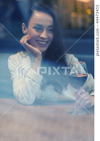 Charming brunette woman thinking about her vacation 44473455