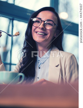 Close up of charming female that being high spirited Close up of charming female that being high spirited 44474087