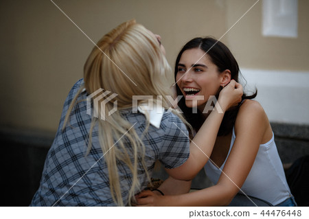 Lesbian couple spending time Lesbian couple spending time 44476448