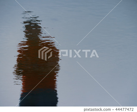 Reflections of man in the Water Reflections of man in the Water 44477472