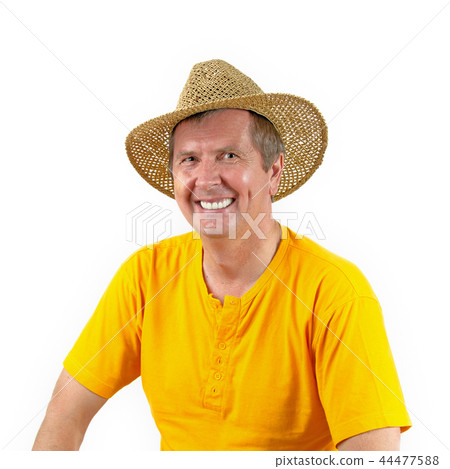 Middle aged man in straw hat on white background Middle aged man in straw hat on white background 44477588