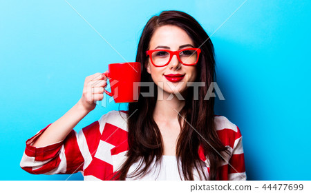 portrait of the young woman with cup of coffee 44477699