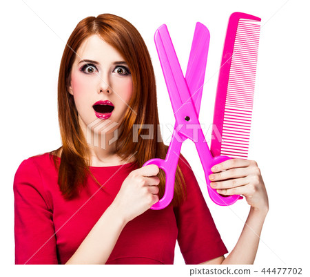 Redhead girl with big scissors and comb 44477702