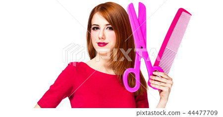 Redhead girl with big scissors and comb 44477709