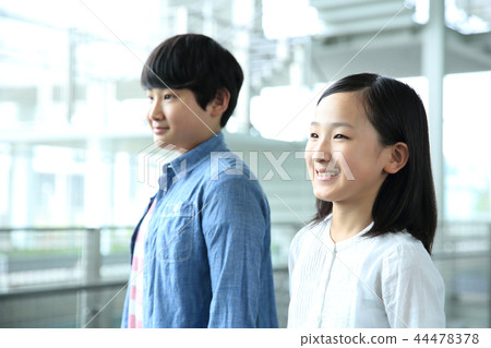 Male and female elementary school students Male and female elementary school students 44478378