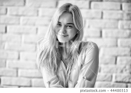 cute blonde black and white / portrait of a beautiful adult blonde girl in vintage style black and white photo cute blonde black and white / portrait of a beautiful adult blonde girl in vintage style black and white photo 44480313
