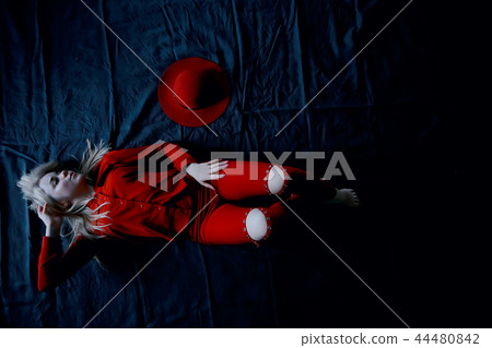 red dress hat blond / glamorous model in bright sexy clothes with red hat 44480842