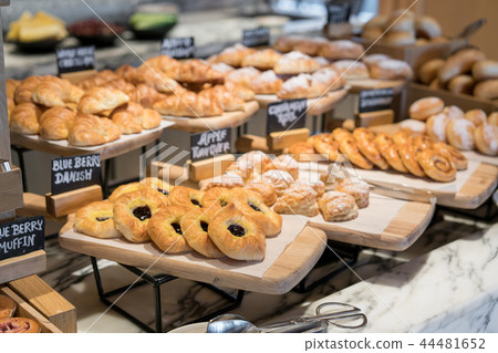 Breakfast lines of different flavor danishs buns 44481652