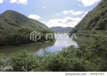 a View through tram window of the country side a View through tram window of the country side 44482767