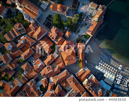 Old town and seashore with beach in Budva in Montenegro 44483638