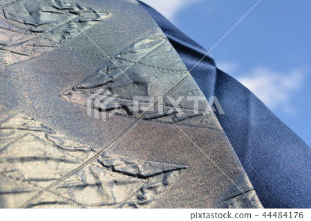 Japanese material image, beautiful Japanese textile, cloth, blue sky background Japanese material image, beautiful Japanese textile, cloth, blue sky background 44484176
