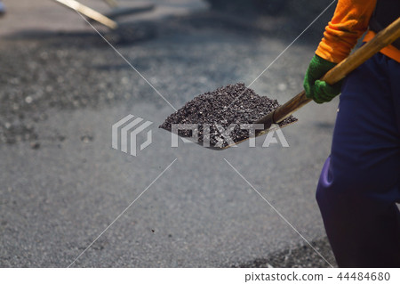 Worker working in roadwork site 44484680