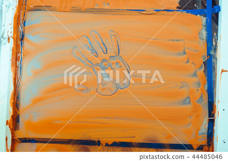 hand print on glass 44485046