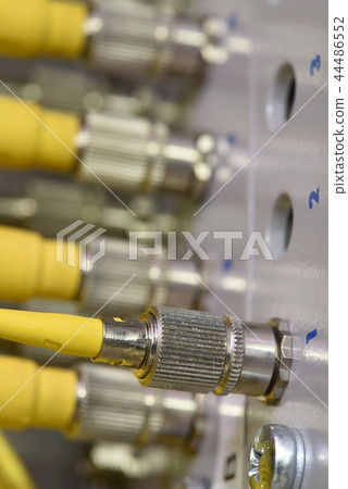 Fiber optic cables connectors close-up Fiber optic cables connectors close-up 44486552
