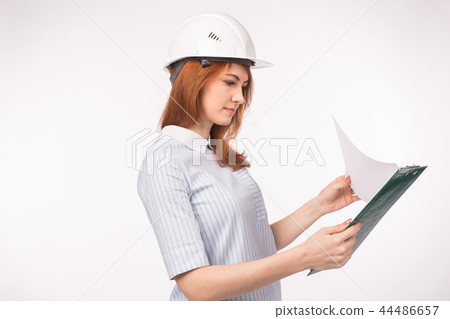 Architect, worker and realtor concept - woman builder or engineer with documents on white background 44486657