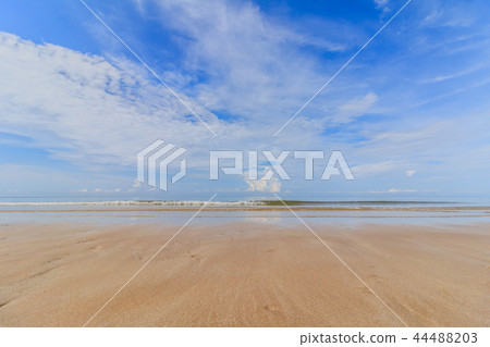 Sea sand sky and soft wave of blue ocean Sea sand sky and soft wave of blue ocean 44488203