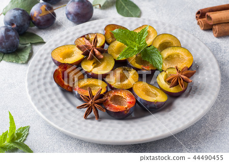 Fresh berries plums in the context of cooking  44490455