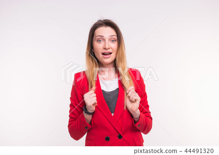 Excited happy red-haired woman on white background 44491320