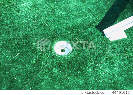 white golf course with green grass white golf course with green grass 44491613