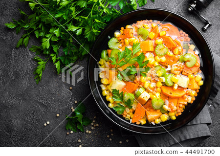 Healthy vegetarian vegetable soup with lentil Healthy vegetarian vegetable soup with lentil 44491700