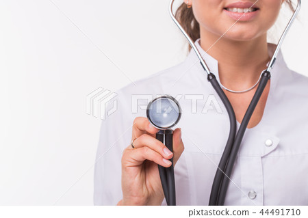 Doctor with phonendoscope, close up over white background Doctor with phonendoscope, close up over white background 44491710
