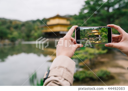 taking picture of Japanese golden temple taking picture of Japanese golden temple 44492083