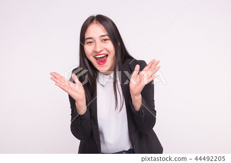 Surprised young asian woman on white background 44492205