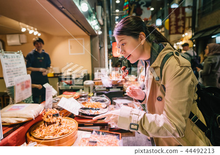 tourist pointing to the Japanese street food 44492213