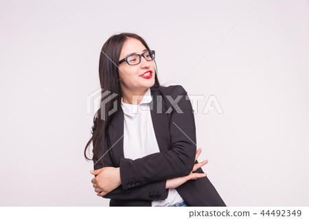 Young asian student or business lady with glasses on white background Young asian student or business lady with glasses on white background 44492349