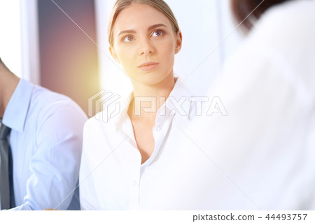 Group of business people or lawyers discussing terms of transaction in office. Meeting and teamwor Group of business people or lawyers discussing terms of transaction in office. Meeting and teamwor 44493757