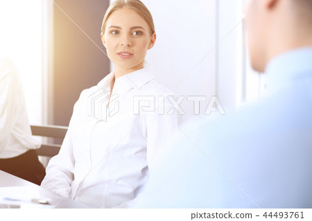 Group of business people or lawyers discussing terms of transaction in office. Meeting and teamwor Group of business people or lawyers discussing terms of transaction in office. Meeting and teamwor 44493761
