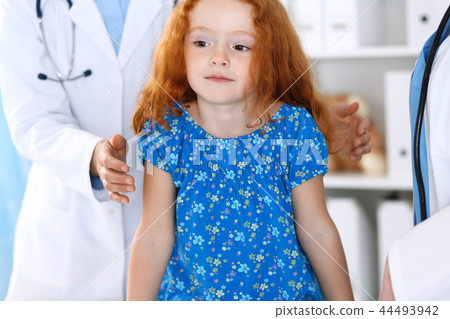Doctor examining a little girl with stethoscope.Medicine and healthcare concept 44493942