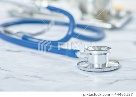 Stethoscope on doctor work park table close up for healthcare diagnosis concept background 44495187