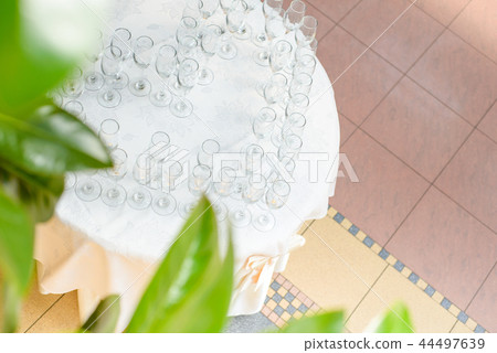 Aerial view to the table with champagne glasses 44497639