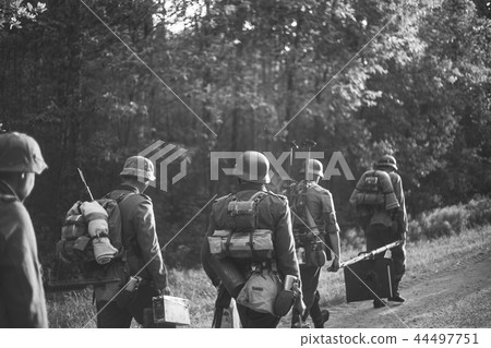 Re-enactors Dressed As German Infantry Soldiers In World War II Re-enactors Dressed As German Infantry Soldiers In World War II 44497751