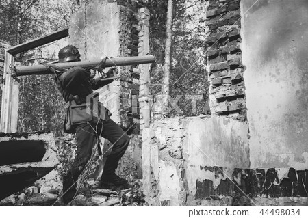 German Wehrmacht Infantry Soldier In World War II Open Fire From German Wehrmacht Infantry Soldier In World War II Open Fire From 44498034