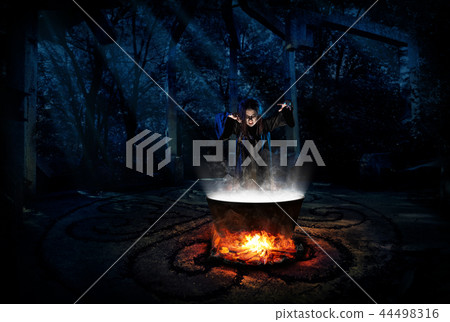 Witch in night forest version 44498316