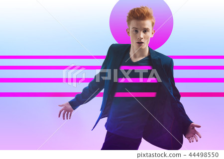 Successful enthusiastic guy calling Successful enthusiastic guy calling 44498550