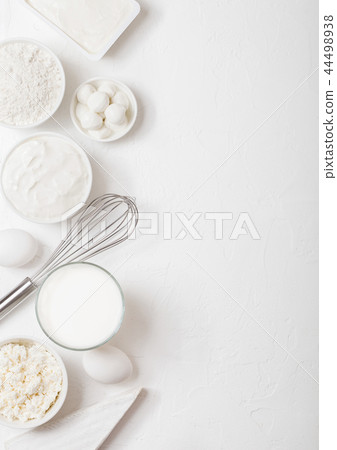 Fresh dairy products on white table background.  44498938