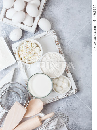 Fresh dairy products on white table background.  44498943