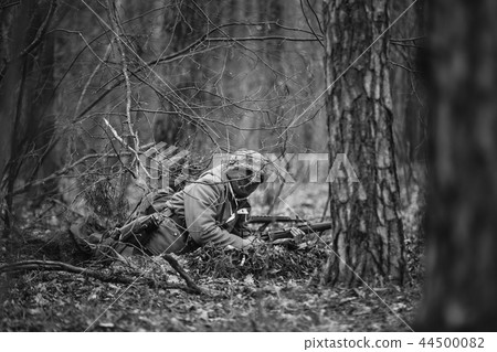 German Wehrmacht Soldier Aiming A Rifle At Enemy From Ground. Ph German Wehrmacht Soldier Aiming A Rifle At Enemy From Ground. Ph 44500082