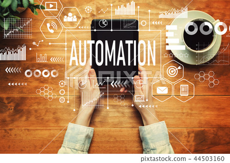 Automation with a person holding a tablet 44503160