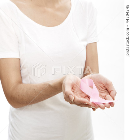 Woman holding a pink ribbon. 44504248