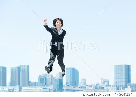Jumping woman (business image) 44508154